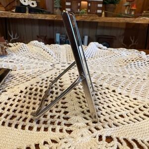 Vintage silver toned Fold Flat Mirror w/Advertising Stand Up Pocket Purse mirror